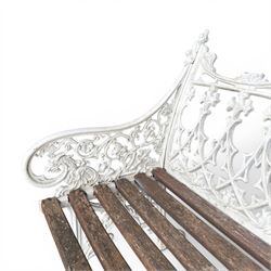 Coalbrookdale Gothic design cast iron and slatted teak garden bench, the ornate pierced back and sides of arched design, with central cartouche shield surrounded by stylised crosses and trefoils with interspersed flowerheads, the scrolled arm terminals with stylised griffon motifs and trailing fruiting vines 