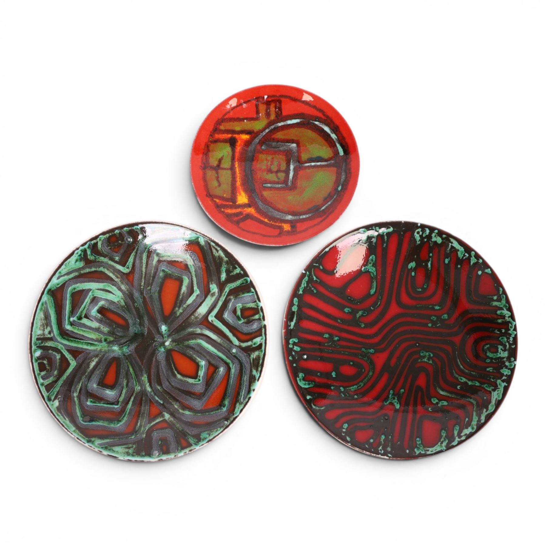 Three Poole Delphis chargers, including Carol Culter and others, largest D26cm