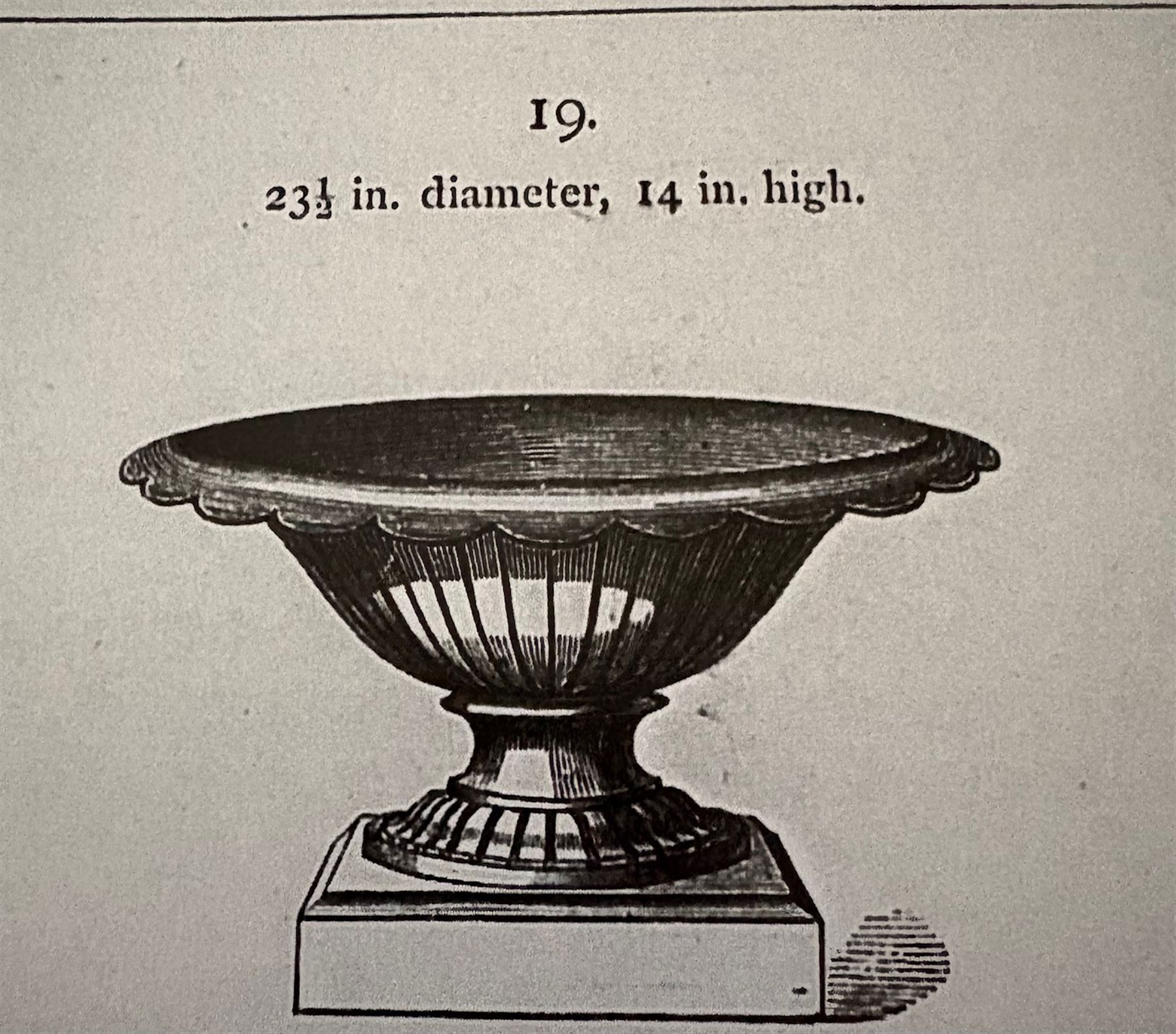 Coalbrookdale - pair of 19th century cast iron petal rim urns, squat form on square plinth, finished in distressed white paint, design registration number 133334, first registered 19 september 1860, number 19 in the Coalbrookdale Castings Catalogue (see illustration)