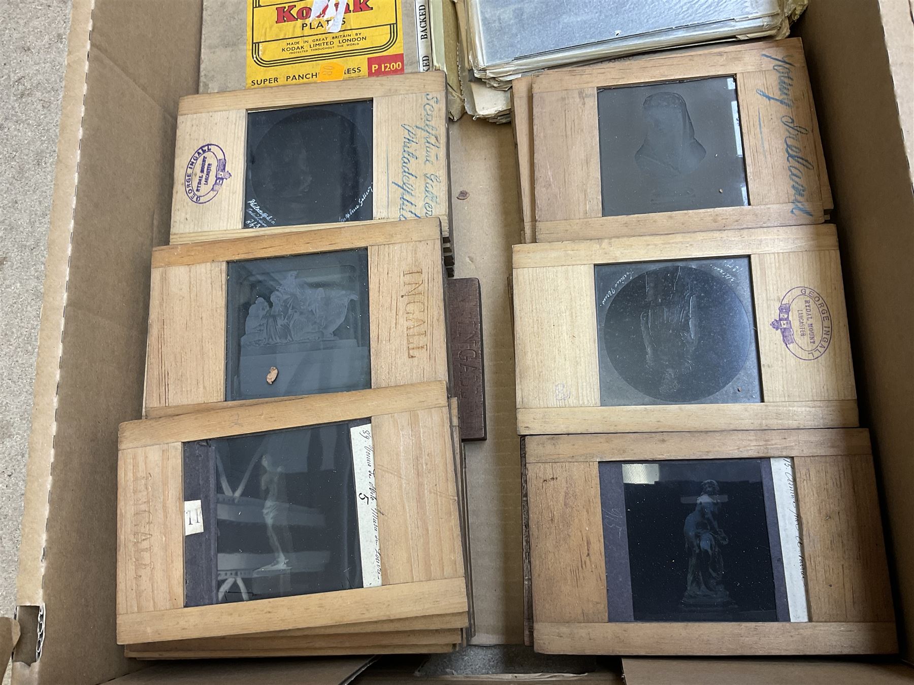 Large collection of over three hundred glass magic lantern slides including country, beach, town and street scenes, some with figures and animals