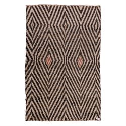Moroccan Berber hand-knotted rug, of rectangular form, ivory ground decorated with bold, r...