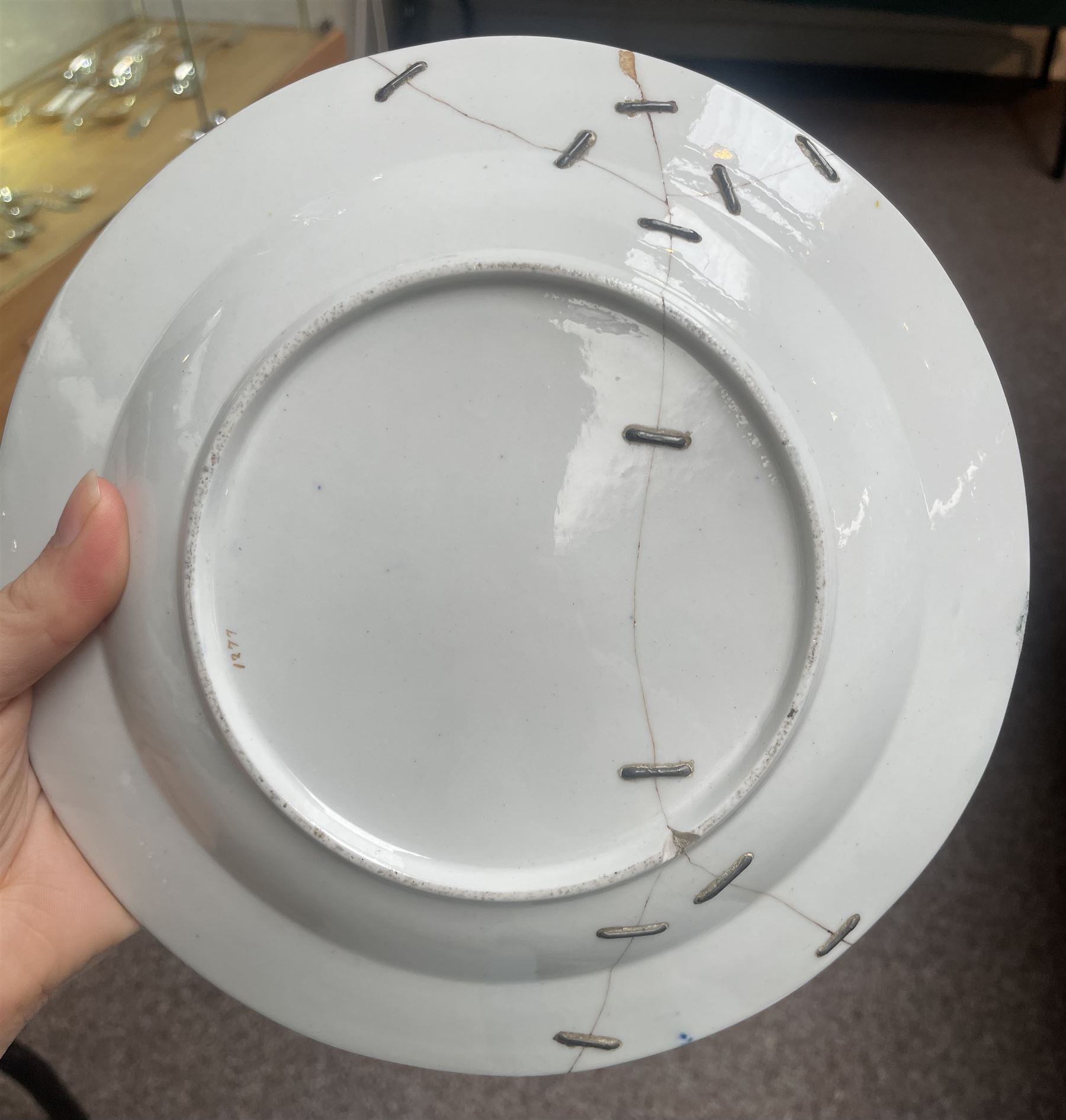 English porcelain Imari tea and coffee wares, pattern 1277, decorated with central orange floral motif surrounded by sprigs of yellow foliage within blue borders, comprising eleven teacups, eight coffee cups, twelve saucers, two shallow bowls and one finger bowl