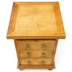 Barker & Stonehouse - pair of contemporary flagstone and mango wood bedside chests, the rectangular inlaid top over three drawers with metal ring handles, on compressed bun feet