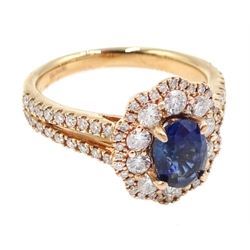 18ct rose gold oval sapphire and diamond cluster ring, with diamond set shoulders, hallmarked, sapphire approx 1.10 carat