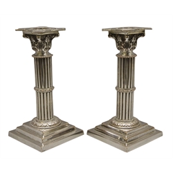  Pair late 19th century silver-plated Corinthian column shaped candlesticks on stepped bases, H20cm (2)   