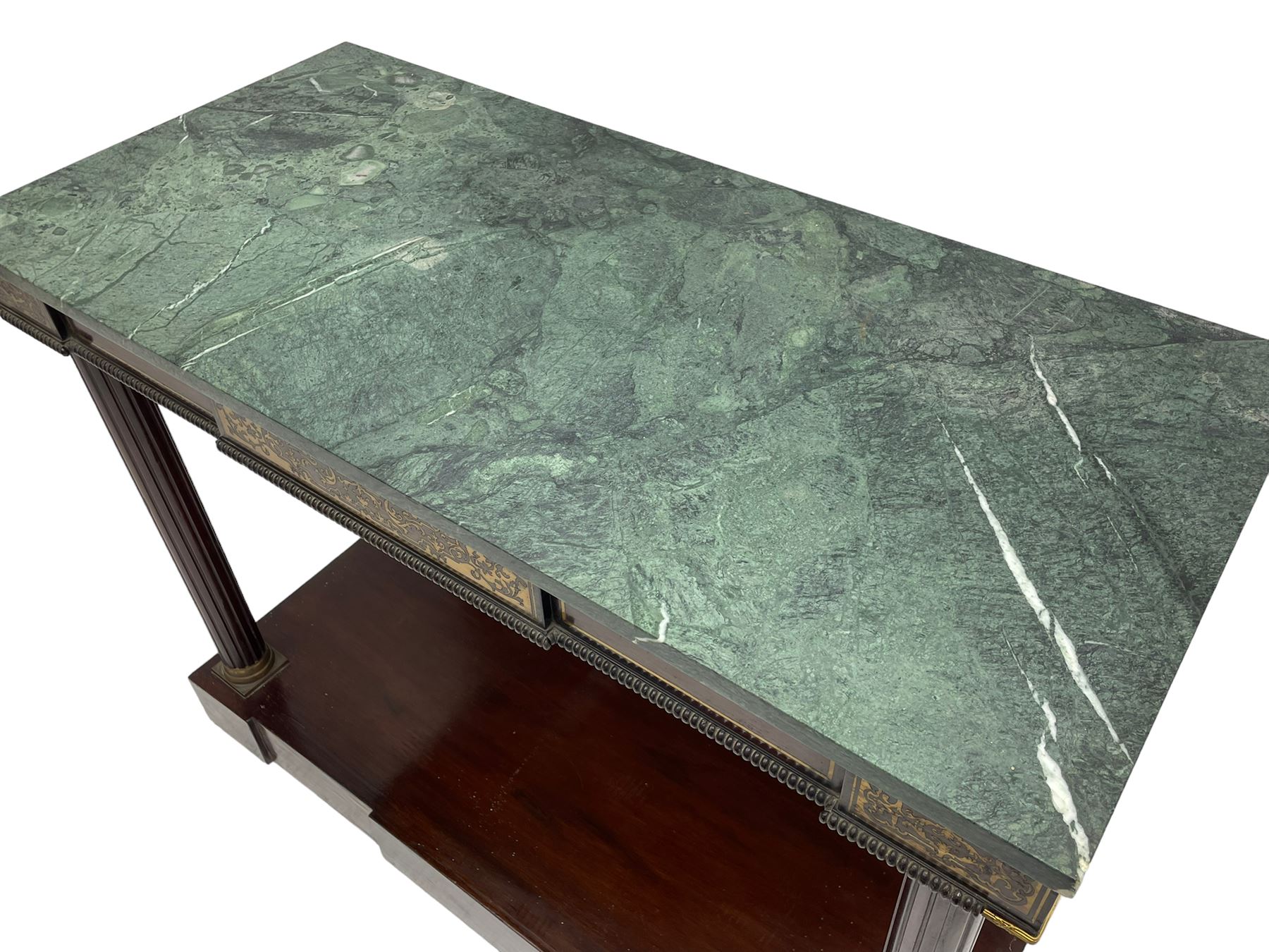 Late 19th century mahogany console or pier table, rectangular green marble top over a break-front frieze inlaid with brass scroll work panels, reed and ribbon gilt metal and wooden beaded applied mouldings, on turned and fluted front supports, plain mirror back over plinth platform base