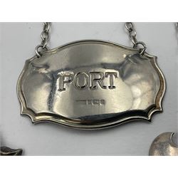 Five modern silver decanter labels, to include two sherry examples, embossed with scrolls and fruits, hallmarked W I Broadway & Co, Birmingham 1991 & 1997, a similar claret example, hallmarked S J Rose & Son, Birmingham 1973, and two plain shaped port and burgundy examples, hallmarked C Robathan & Son, Birmingham 1997 and A Haviland-Nye, London 1968
