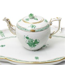 Herend porcelain Tete a Tete decorated in the green Chinese Bouquet pattern, comprising cabaret tray, two cups and saucers, tea pot, leaf shape bowl and milk jug