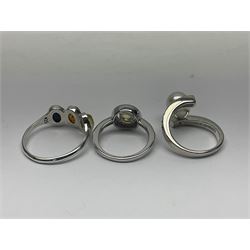 Seven silver and silver-gilt stone set rings