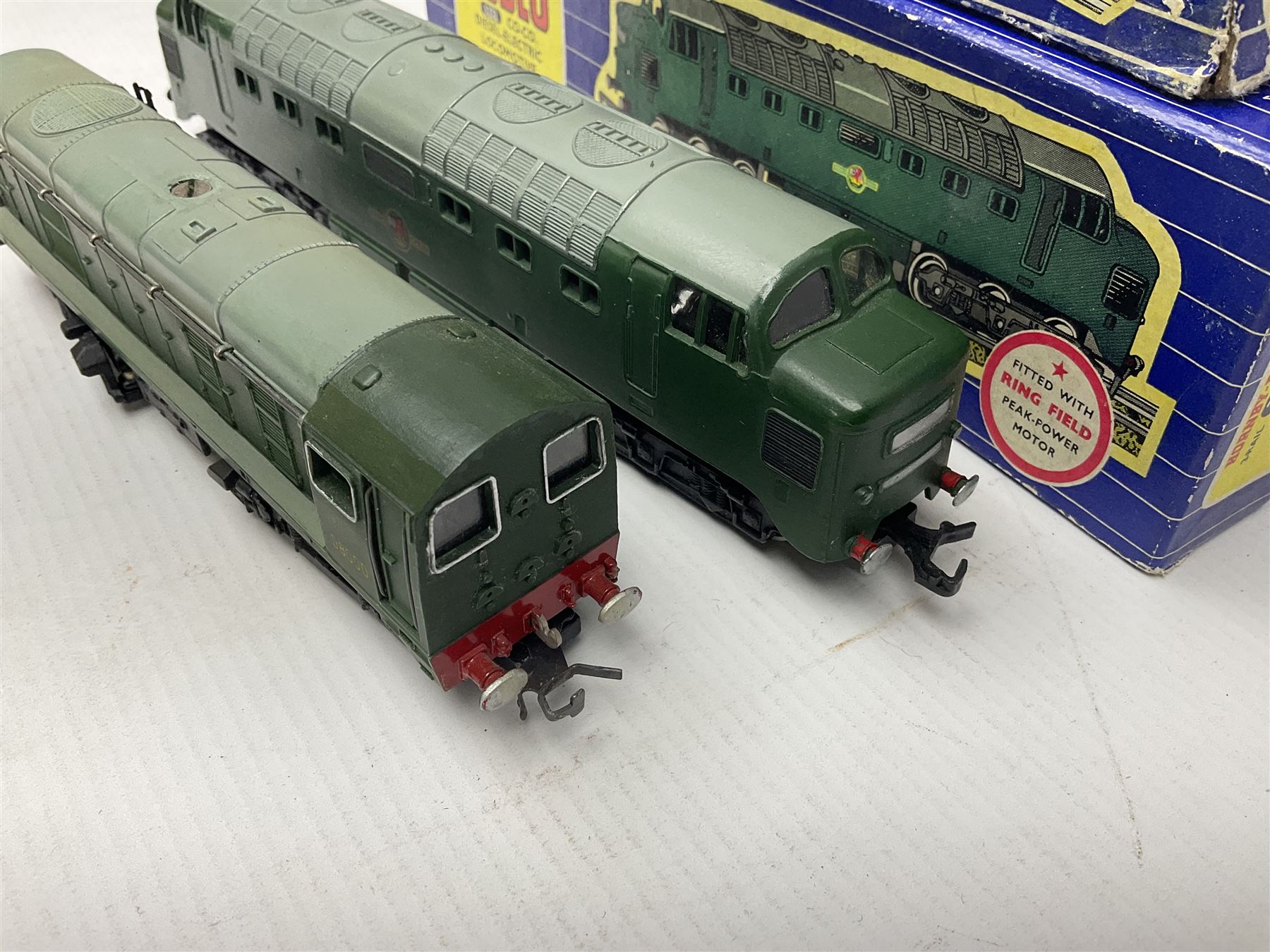 Hornby Dublo - three-rail - Deltic Type Diesel Co-Co locomotive with instructions and guarantee; and Class 20 1000 B.H.P. Bo-Bo Diesel Electric locomotive No.D8000; both in BR green; and each in original blue striped box (2)

