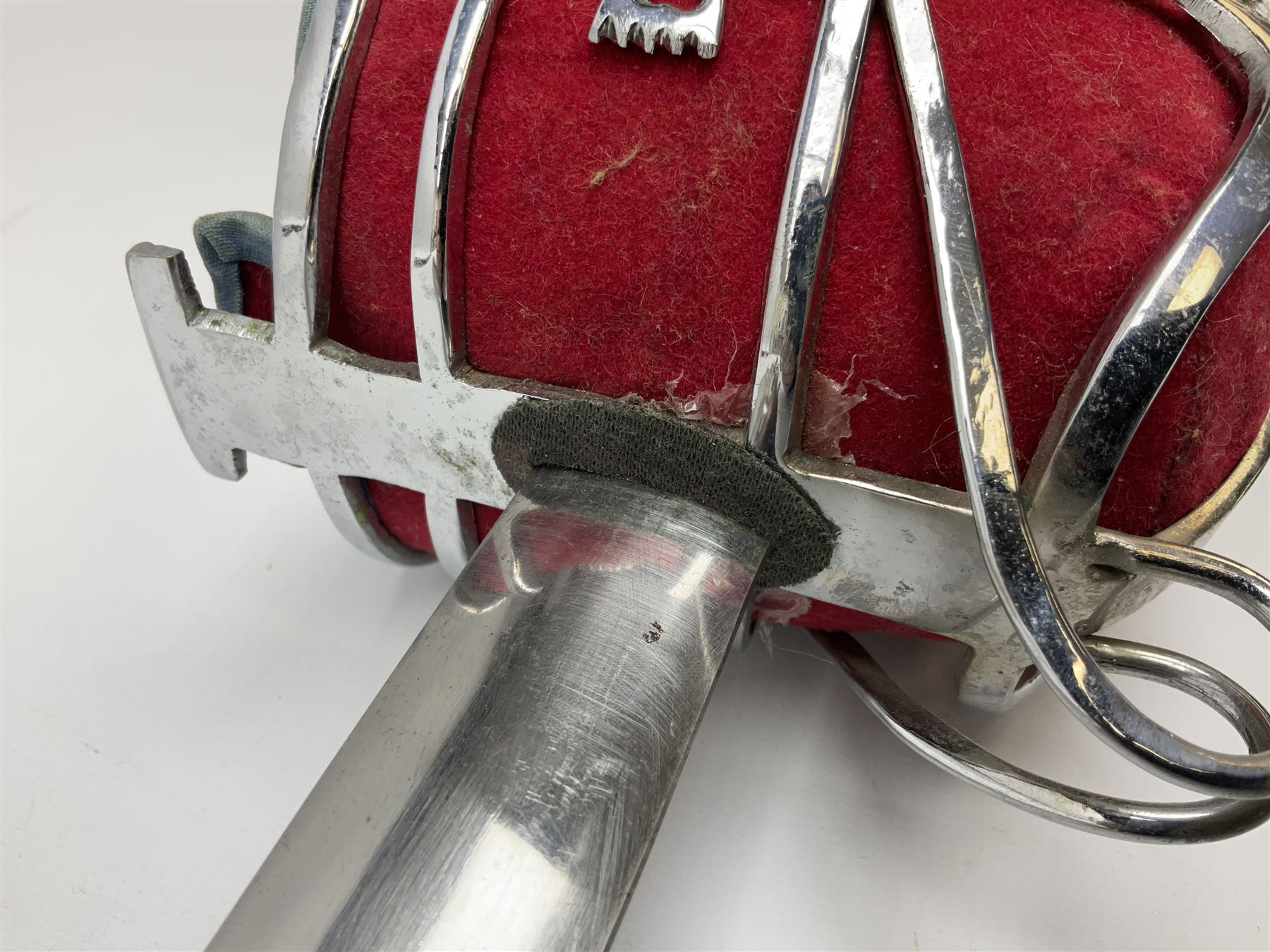 Reproduction Scottish basket hilted broadsword with 85cm double edged steel blade and red lined basket hilt with wire bound grip, in white metal mounted leather scabbard 107cm overall