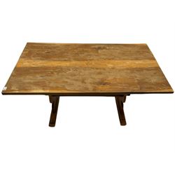 Yorkshire walnut Squirrelman rectangular table, trestle and stretcher base, and two chairs
