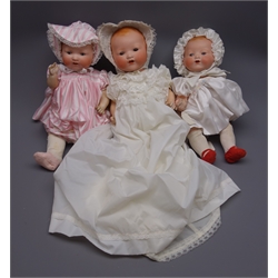  Three Armand Marseille 'My Dream Baby' bisque head dolls, each with moulded hair, sleeping eyes, open mouth with teeth and composition body with jointed limbs, one marked 'AM Germany 351/6K', one marked 'AM Germany 351/5K' and one marked 'AM Germany 351/4K', largest 47cm (3)  