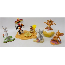  Coalport Characters 'Tom and Jerry' Jerry on celebration cupcake and two Wedgwood 'Tom and Jerry' models Tom and the other of Jerry, Coalport Characters 'Looney Tunes' 'Arriba! Arriba!' and a Wedgwood 'Looney Tunes' model of Bugs Bunny, all boxed  