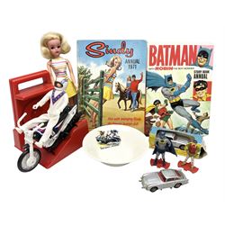 Collection of toys to include Corgi James Bond Aston Martin DB5 No.270; boxed with secret instructions; another unboxed Corgi James Bond Aston Martin DB5; Sindy Doll with 1971 Sindy Annual illustrating Sindy wearing the same outfit to the cover; Batman 1966 Annual, nursery bowl and pair of figures; and Ideal Evil Knieval action motorcycle figure