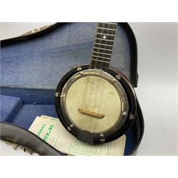 Dulcet eight-string banjo mandolin with mother-of-pearl inlaid ebonised fingerboard L55.5cm; cased; and Irish mahogany bodhran hand drum with inlaid stringing and vellum top D46.5cm; in soft carrying case with double ended beater (2)