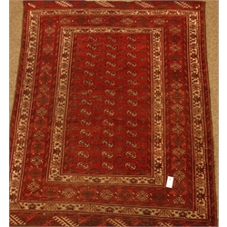  Persian Bokhara red ground rug, repeating Gul design, 172cm x 131cm  