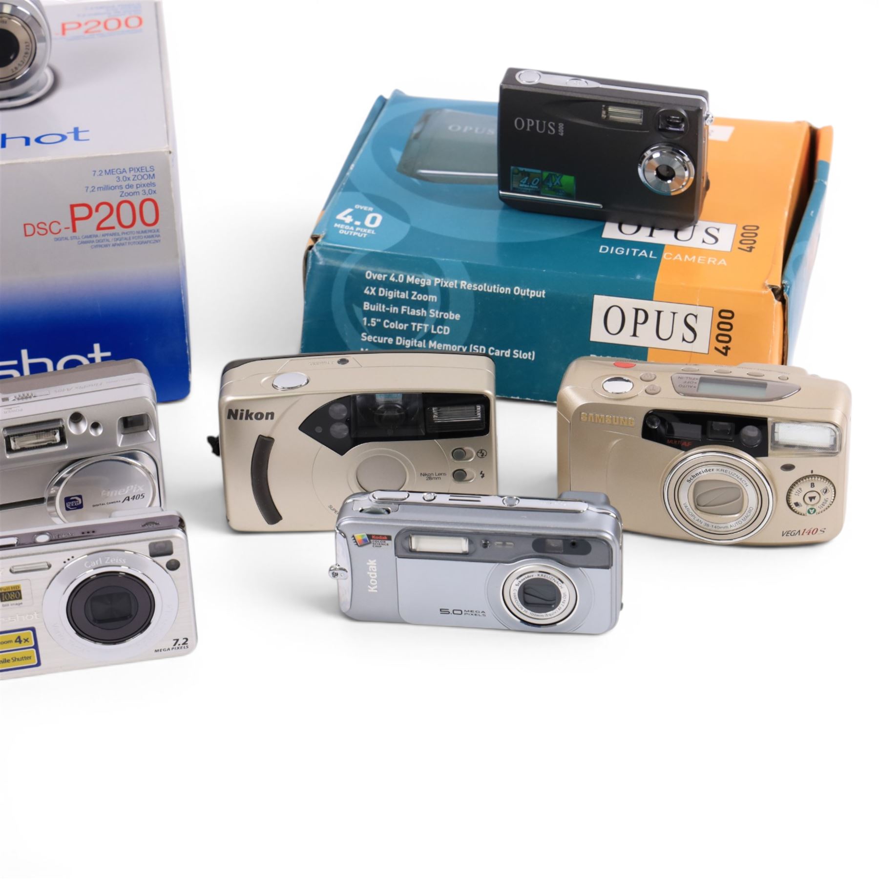 Eight digital cameras, comprising Sony DSC-P200, Opus 4000, Nikon Fun Touch 6, Fujifilm Finepix A405, Sony Cybershot, Samsung Vega 140, Fujifilm S7000 and Kodak Easy Share LS753, two boxed