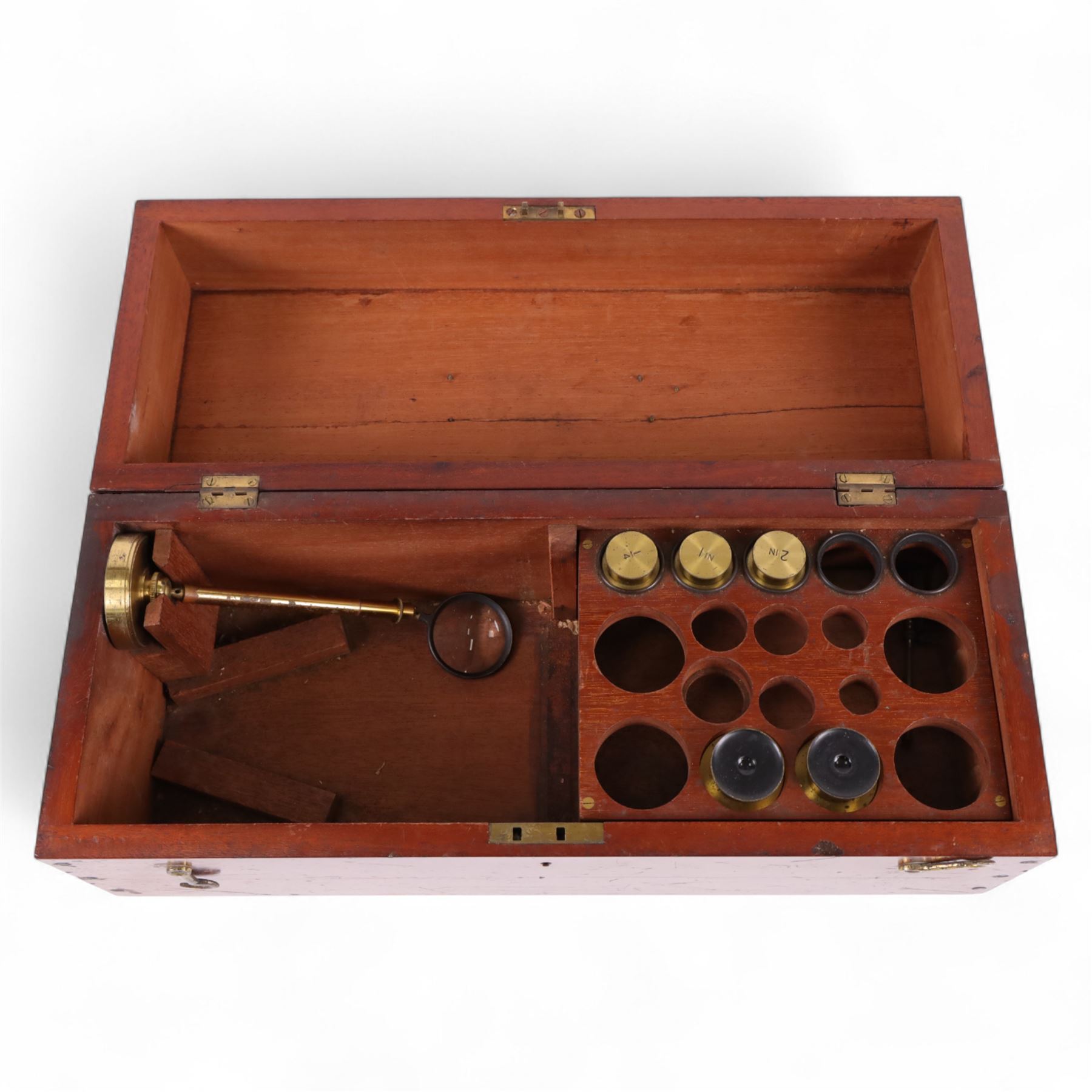 19th century brass binocular microscope by R&J Beck, London, numbered 5527, with rack and pinion focusing, with four eye pieces and three objective lenses, in wooden case