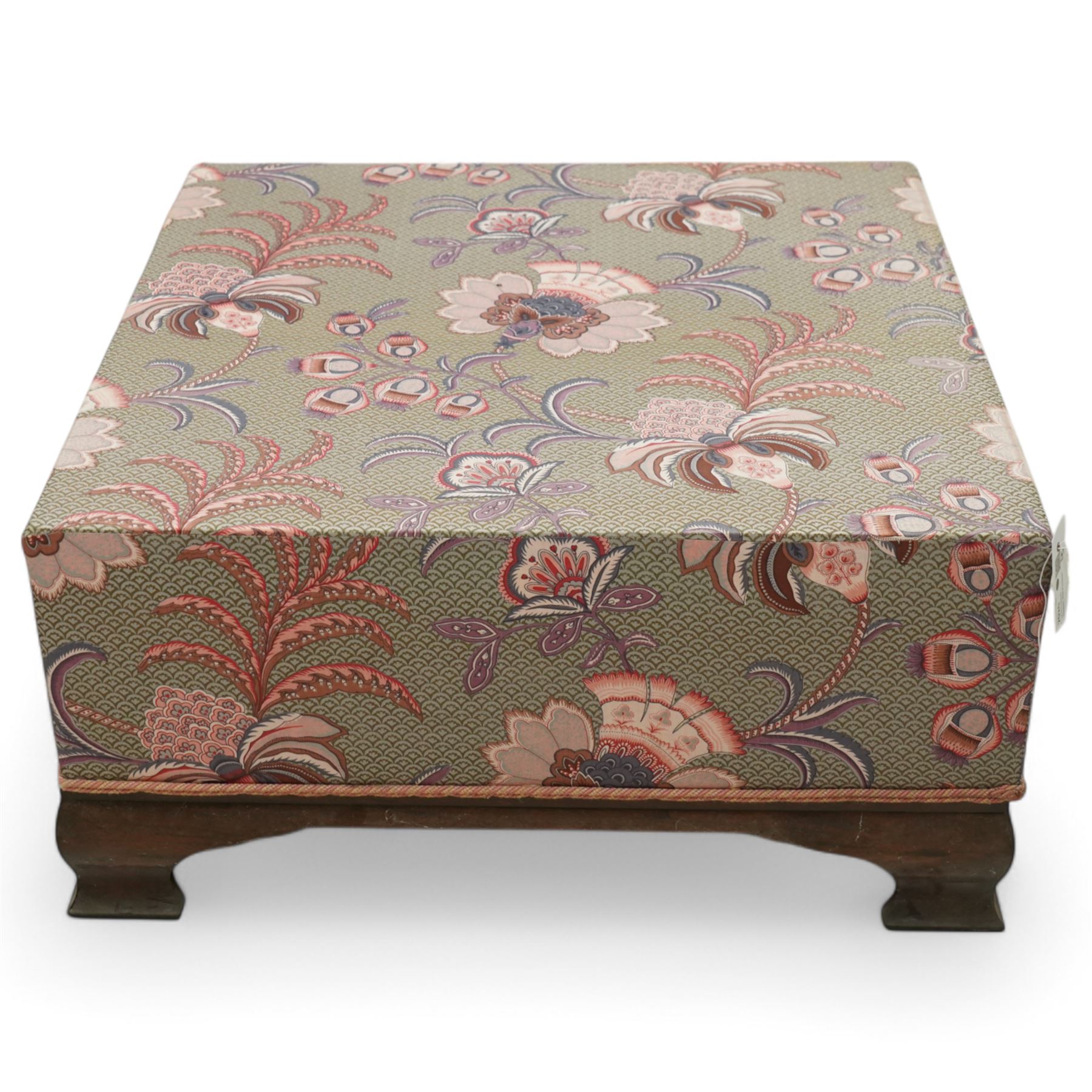 Hardwood-framed square pouffe or footstool, upholstered in floral pattern fabric, on ogee bracket feet
