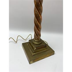 Early 20th century brass and copper Corinthian column table lamp, the square stepped brass base leading to a spiral twist copper column and brass Corinthian capital, H44.5cm 