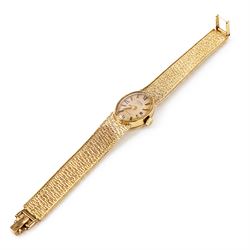 Rotary ladies 9ct gold manual wind wristwatch, gilt dial with baton and Roman numeral hour markers, back case engraved with initials and dated, on integral 9ct gold bracelet, hallmarked