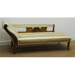  Edwardian walnut framed chaise longue, upholstered in a striped beige fabric, scrolled and carved arm, turned supports, L170cm  