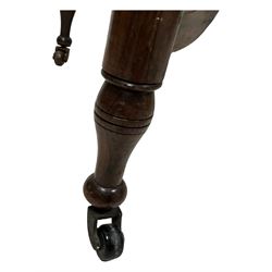 Late Victorian walnut writing table, rectangular leather-inset top surmounted by a brass gallery, fitted with a single frieze drawer, raised on turned tapering supports with lower undertier and ceramic castors