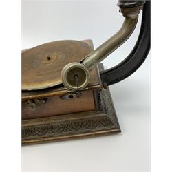 A wind up gramophone with red painted tin plate horn, upon a mahogany base, overall H71cm.