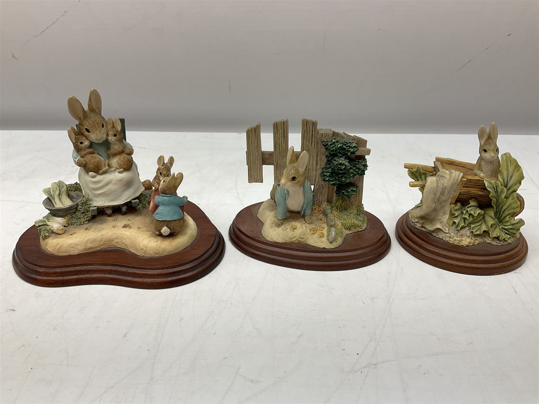 Frederick Warne & Co The World of Beatrix Potter figures to include Peter Rabbit in Mr Mcgregor's Garden, Peters Hiding place, Mrs Tiggy Winks, The Tale of Jonny Town-Mouse, etc, many with original boxes 