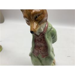 Two Royal Doulton Brambly Hedge figures comprising ‘Mrs Saltapple’ and ‘Poppy Eyebright’, Royal Albert Beatrix Potter ‘Foxy Whiskered Gentleman’ and ‘Mr Benjamin Bunny’, all with boxes, two Border Fine Arts Beatrix Potter figures comprising ‘Mrs Tiggywingle’ and ‘Mrs Rabbit’, Royal Doulton ‘Spike and Tyke’ and ‘Winnie Pooh and Footprints’ both with boxes, all marked beneath