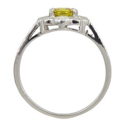 Platinum emerald cut yellow sapphire, baguette and round brilliant cut diamond cluster ring, stamped Plat, sapphire 1.30 carat, total diamond weight 0.55 carat, with World Gemological Institute Report