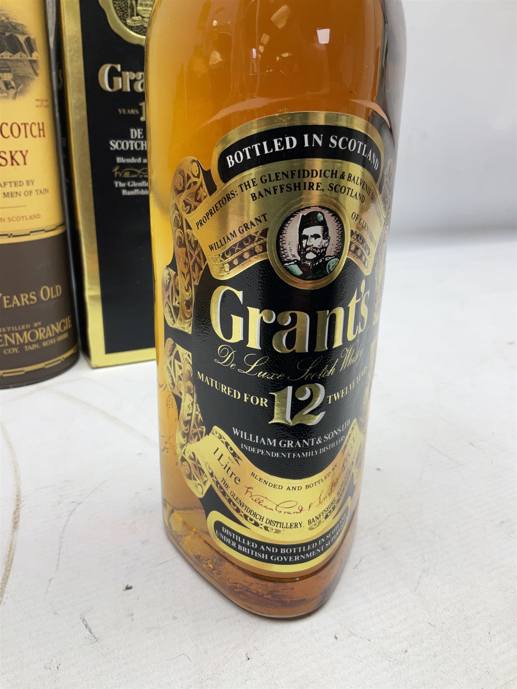 Glenmorangie, ten year old Scotch whisky, 1 litre 43% vol, Grant's twelve year old Scotch whisky 1 litre, 43 G.L and Johnnie Walker Black Label, twelve year old Scotch whisky, 1 litre 43% vol, all boxed (3)