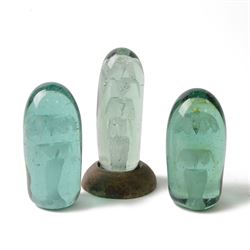 Three Victorian green glass dump paperweights with floral sulphur inclusions, tallest H17cm