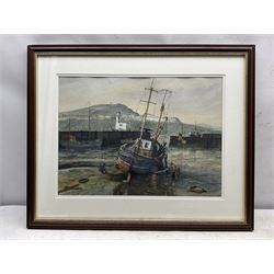James W Hardy (British 20th century): Cleaning a Trawler in Scarborough Harbour, watercolour signed 31cm x 43cm