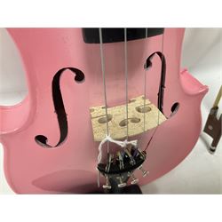 Zest full size pink violin, with a solid wood body and maple head, with matching pink bow and two further bows, in a hard case Length 60cm