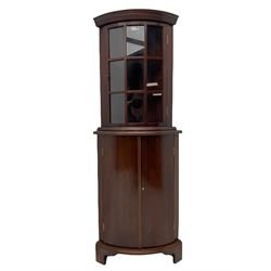 Late 20th century mahogany floor standing (W55cm, H82cm), and wall hanging (W51cm, H66cm) corner cabinets, both bowed, the wall hanging cabinet with glazed door, the floor standing cabinet on bracket feet, can be combined into one 