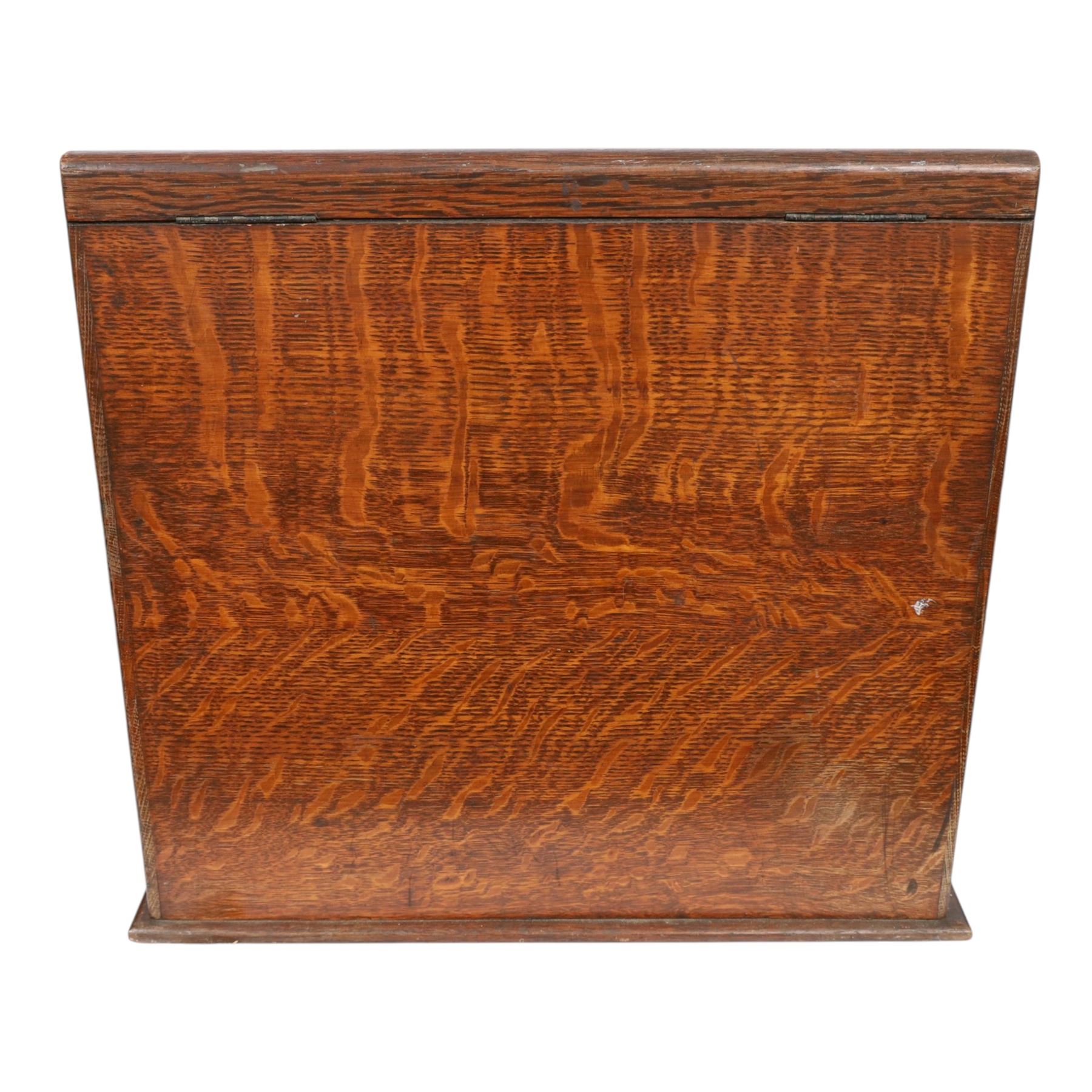 Victorian oak perpetual calendar roll-top desk, tambour front enclosing fitted interior with pigeonholes and pen trays, the raised back fitted with rotating date and month apertures, over single frieze drawer with cast brass handle, on plinth base