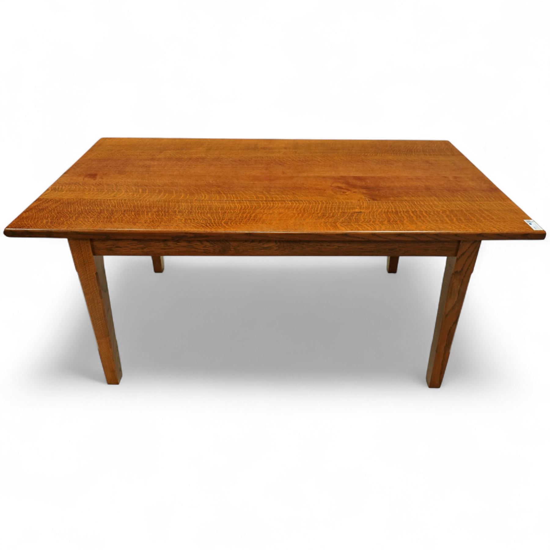 Contemporary solid oak refectory dining table, rectangular quarter-sawn top displaying pronounced medullary rays, on square chamfered legs united by stretchers