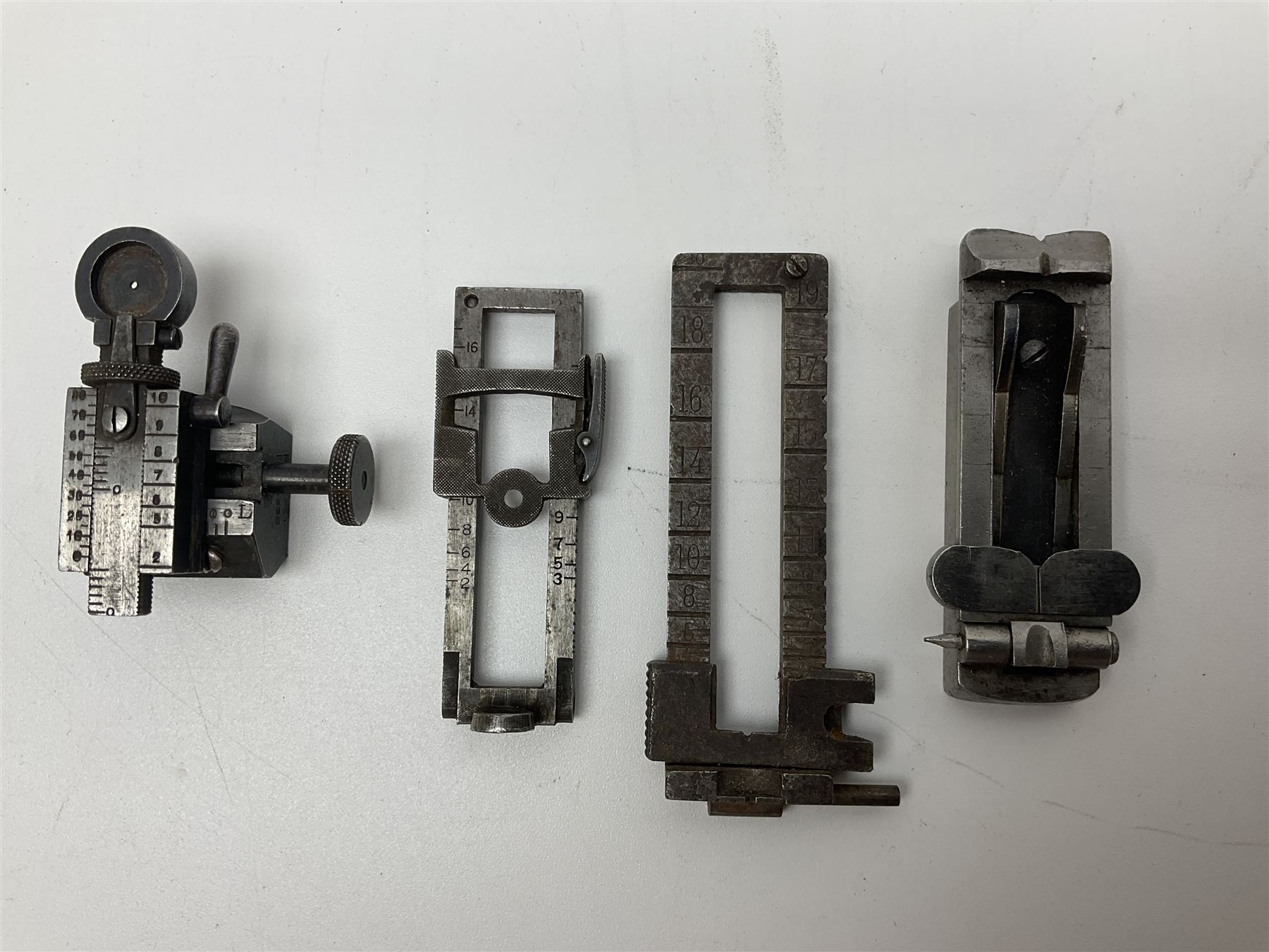 Collection of rear sights and mounts etc including Fraser Edinburgh patent pending no.28330, Martini Henry, part Mauser, .303 No.4 etc