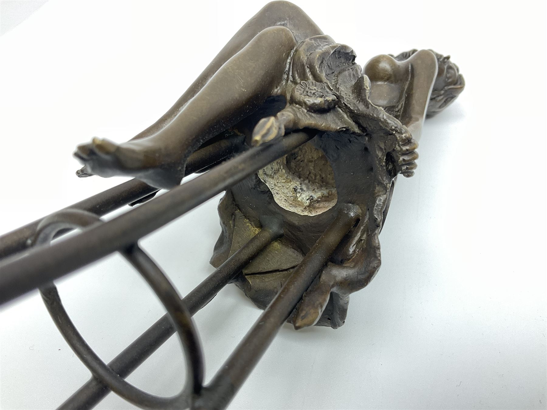 Art Deco style bronze, modelled as a semi naked female figure seated upon a chair. H27cm.

Created in the style of French Artist, Pierre Collinet, who was recognised for his bronze sculptures. This figure echoes the style and tone of Collinet's work and is attractive to behold. It would make for a lovely decorative addition to any home, modern or traditional. 