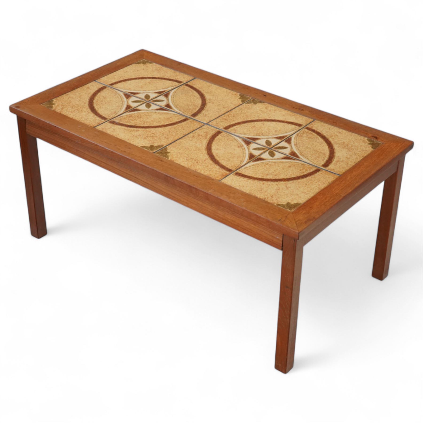 Mid-20th century Danish teak coffee table, rectangular form with inset ceramic tiled top decorated with circular and foliate motifs, raised on square legs