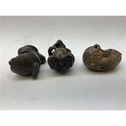 Group of fourteen Netsuke, to include two examples modelled as tortoise with a frog upon its shell, rhino, tiger, bird etc, some with marks beneath