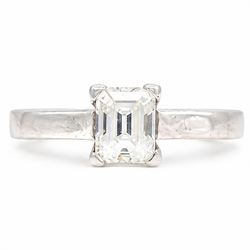 18ct white gold diamond ring, four claw set with a single emerald cut diamond of 1.01 cara...