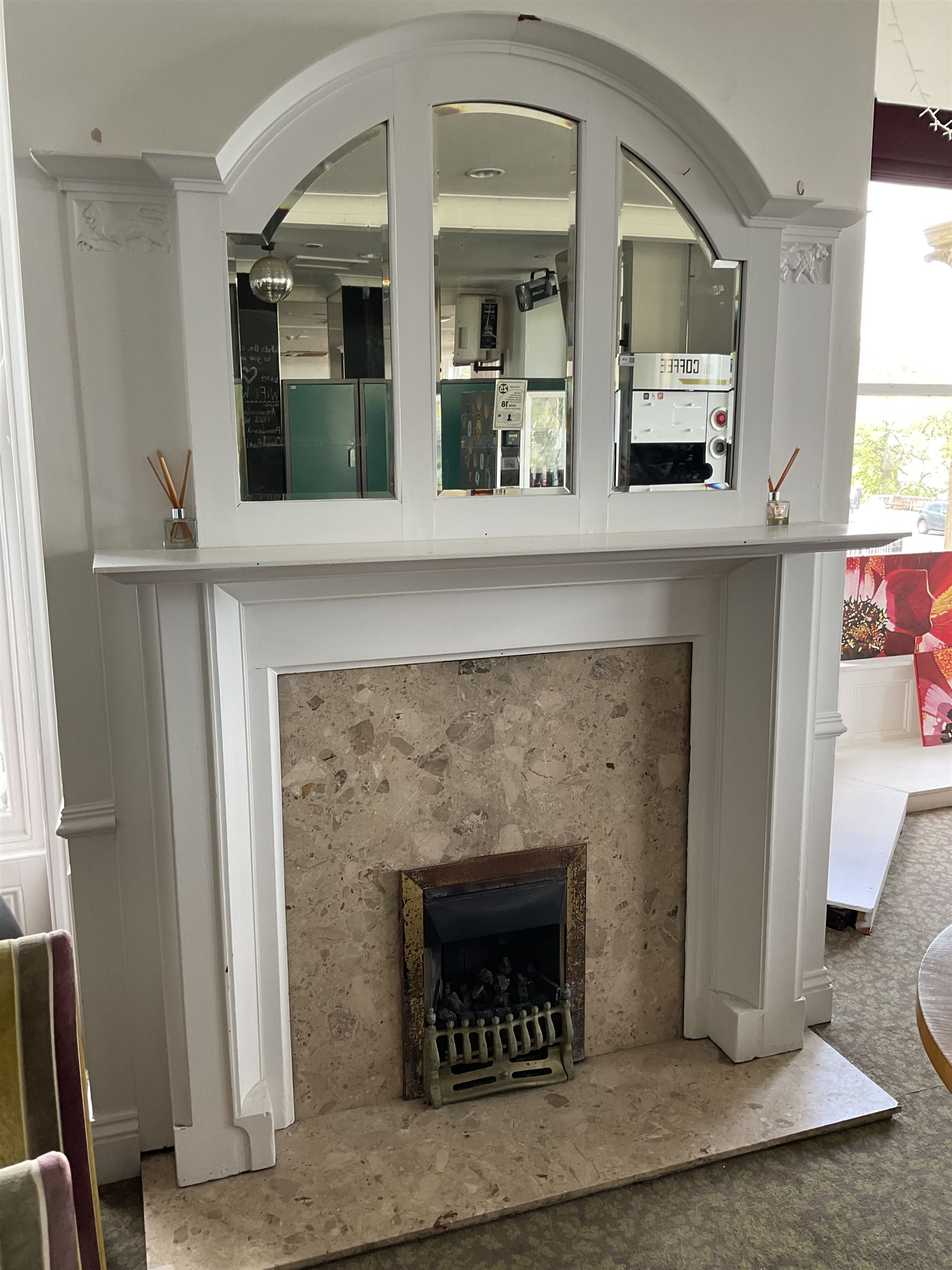 White painted fireplace, with overmantle mirror, marble hearth and
