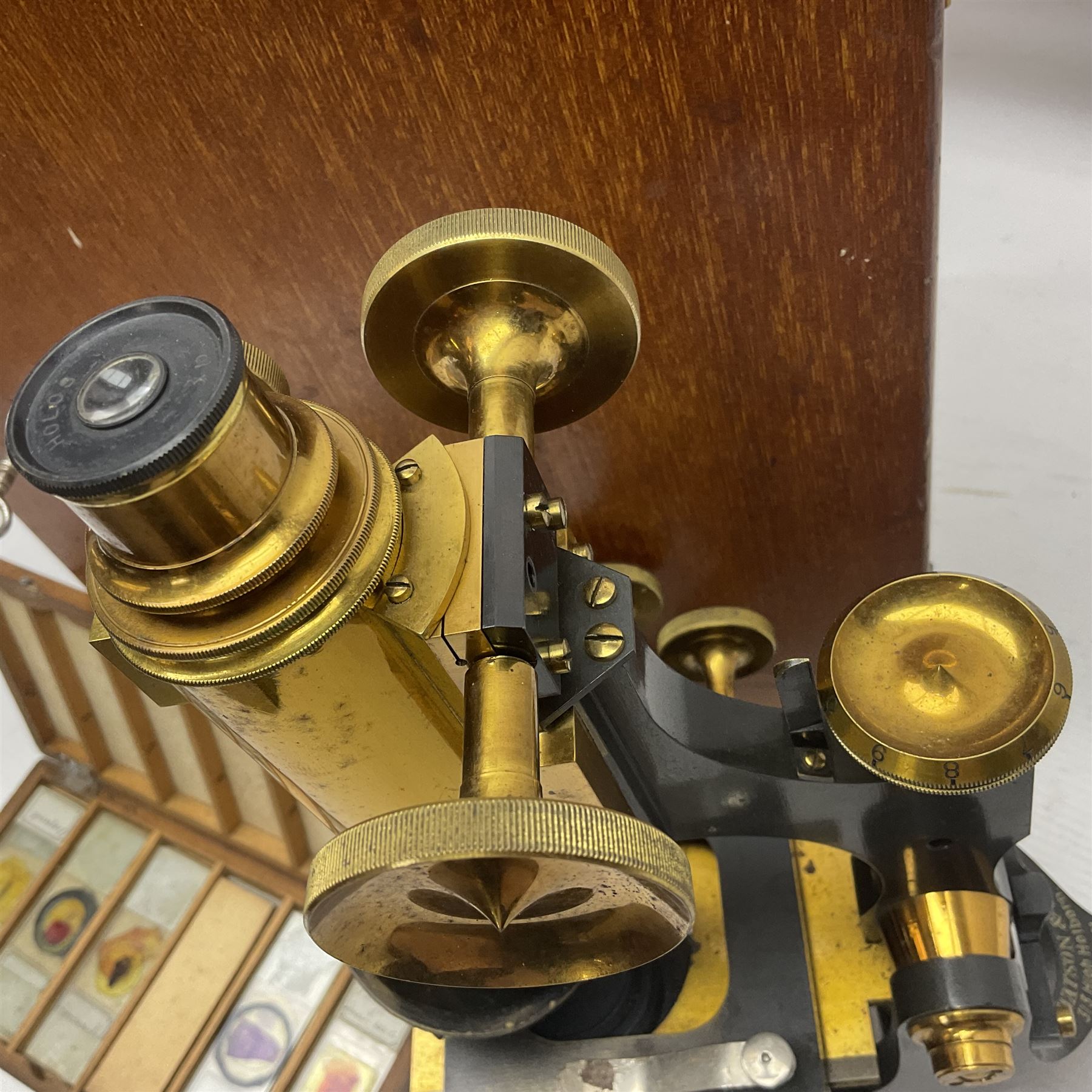 W. Watson & Sons Ltd lacquered brass compound microscope circa 1910, the back foot signed W. Watson & Sons Ltd, 313 High Holborn London and numbered 8193, together with a boxed collection of glass microscope biological sample slides
