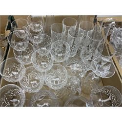 Large collection of glassware, to include twelve wine glass set, twelve champagne flutes, eight brandy glasses, two decanters etc, in three boxes  