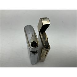 Collection of lighters, including Ronson Varaflame, Zorr Classic, Dunhill bark effect roller gas lighter, and faceted blue glass table lighter, etc