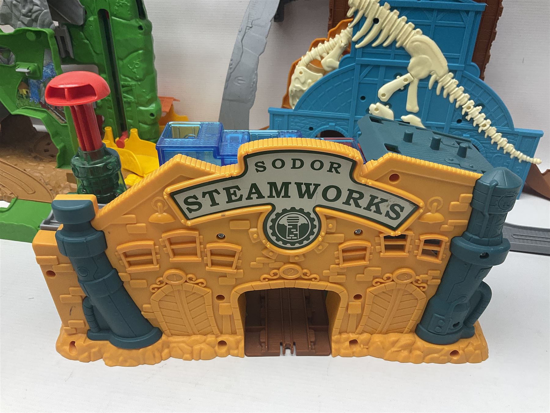 Quantity of Thomas the Tank Engine playsets and track, and Thunderbirds 2004 Tracy Island playset with some associated vehicles, in two boxes 