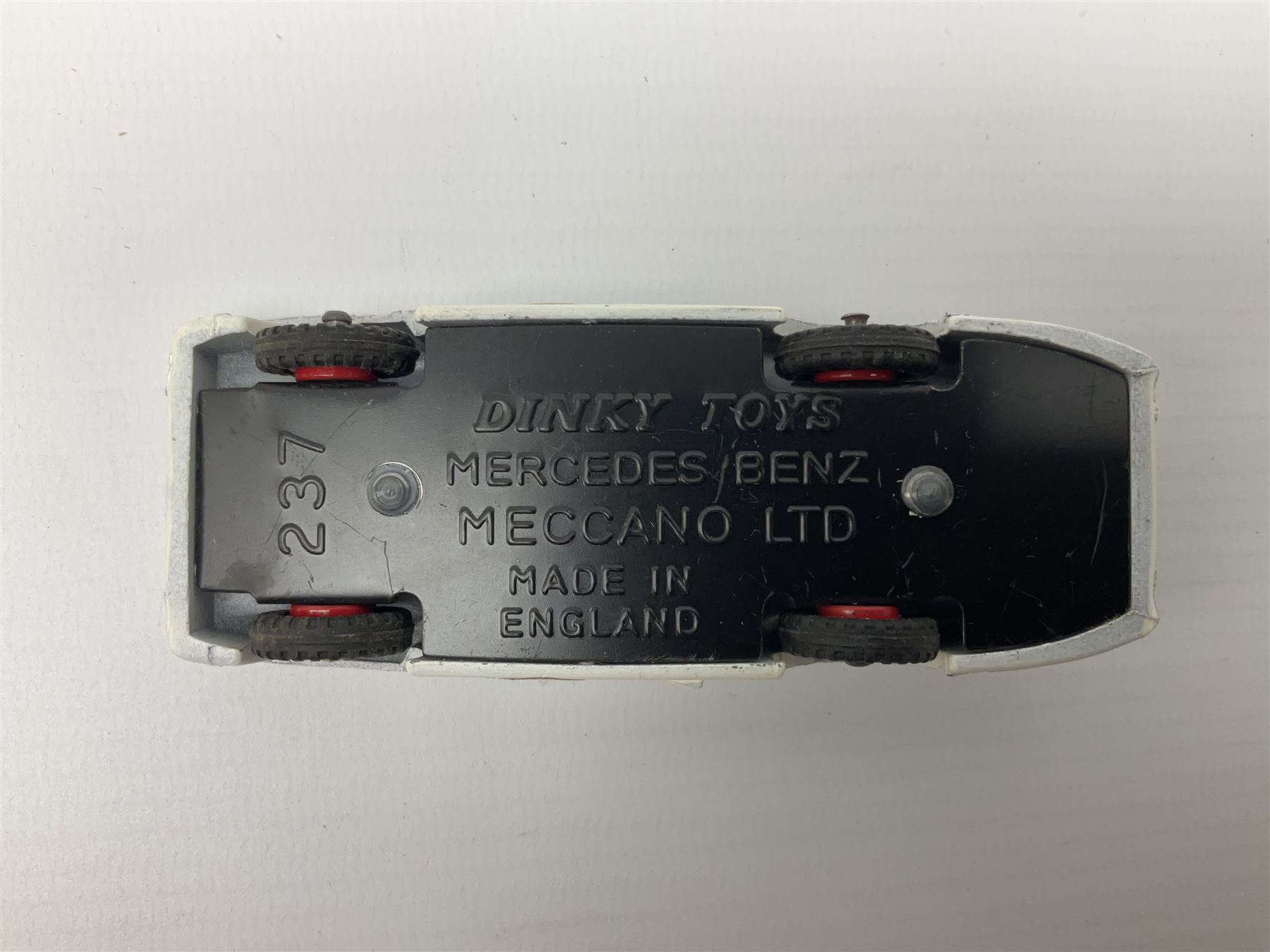 Dinky - Mercedes Benz Racing Car RN 36, No.237; Motorway Police Car No.269; Austin Mini-Moke No.342; Beechcraft S 35 Bonanza Aircraft with two pieces of luggage No.710; all boxed: and Rolls Royce Phantom V Limousine No.152; box base only with no cover (5)